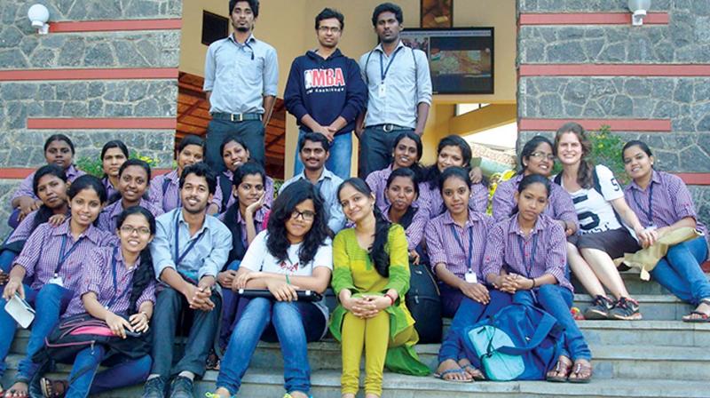Students sitting in front of the CREST building at Chevarambalam, Kozhikode.  File pic