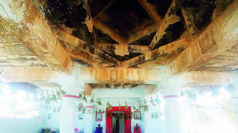 Top: The ceiling of the temple is decorated with massive carvings of post Vijayanagara style. (Photo: P. Surendra )