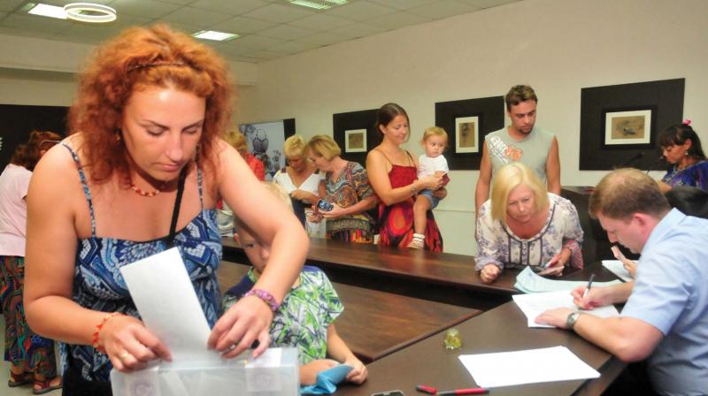 A Russian voter casts her franchise for the Russain Presidential election at Russian Cultural Centre in Thiruvananthapuram on Saturday  (Photo: A.V. MUZAFAR)