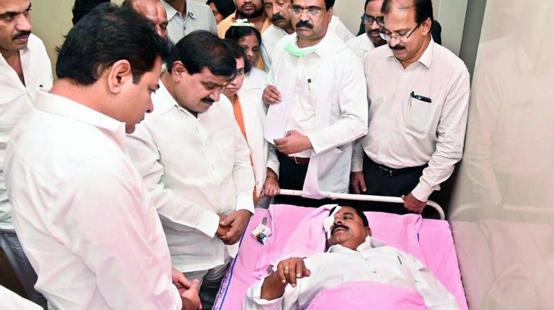 Council Chairman Swamy Goud being treated by doctors after he was injured in the assembly. KTR and others rush to Sarojini Devi eye hospital to enquire about his health condition. (Photo: BHMK Gandhi)
