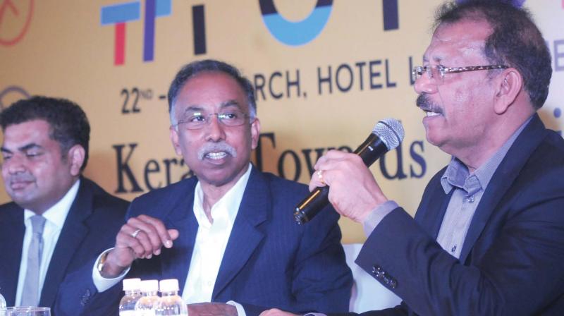 S.D. Shibulal, chairman, High Power IT Committee, govt of Kerala (centre) with members V.K. Mathews (right) and Rajesh Nair at the press conference on the upcoming Global Digital Summit - #FUTURE organised by IT department, Government of Kerala, in Kochi on Monday.