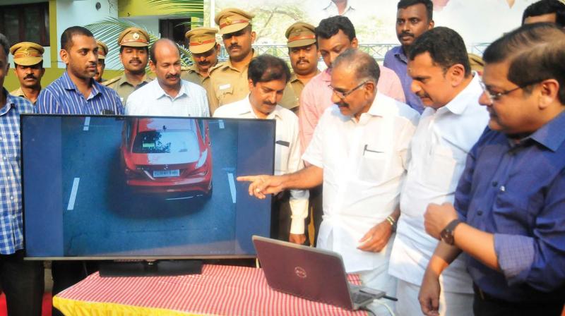 Transport minister A.K. Saseendran commissions the automated speed detection system along Kowdiar - Vellayambalam stretch on Thursday. K. Muraleedharan, MLA, and transport commissioner K. Padmakumar are also seen (Photo: A.V. MUZAFAR)