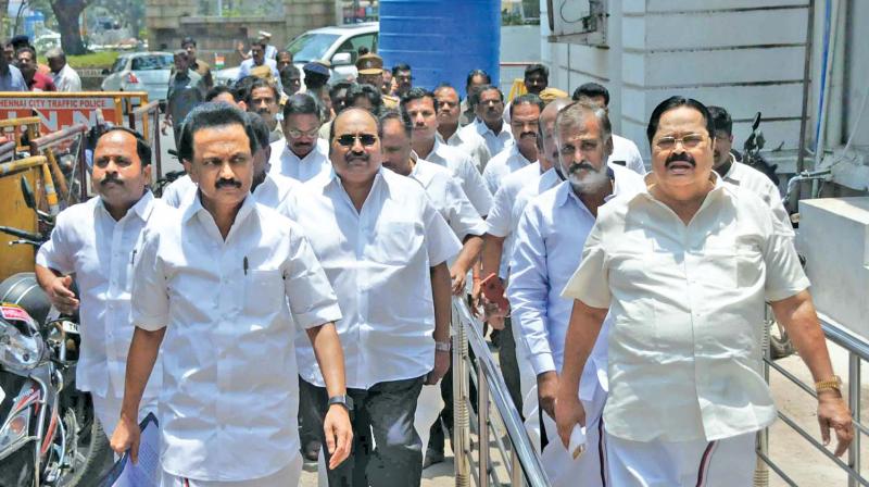 Opposition leader M.K. Stalin arrives at the secretariat along with party legislators to meet the Assembly speaker. (Photo: DC)