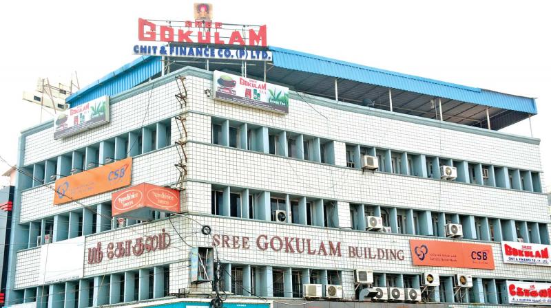 Income tax officials on Wednesday conduct a raid on the property of Gokulam Group in Kodambakkam. (Photo: DC)