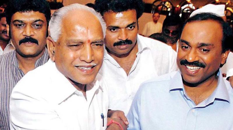 Former minister Gali Janardhan Reddy, former CM B.S. Yeddyurappa and Ballari MP B. Sriramulu in a file photo.