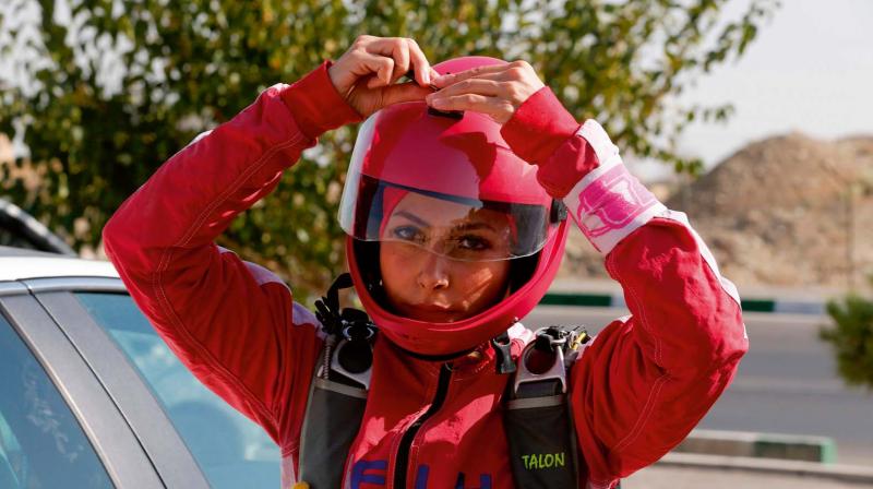 Iranian skydiver Bahareh Sassani prepares for a jump at the Hemat flight site in Tehran	 AFP