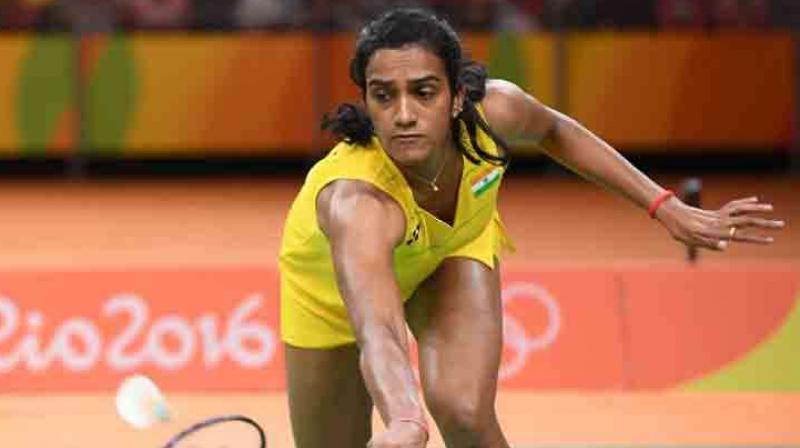 The sixth seed PV Sindhu defeated Danish Mette Poulsen 21-10, 21-11 in the first round match of the championship. (Photo: AFP)