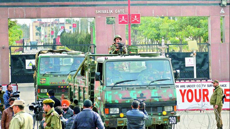 Security forces guard the Sunjuwan Military Station in Jammu on Sunday. (Photo: PTI)