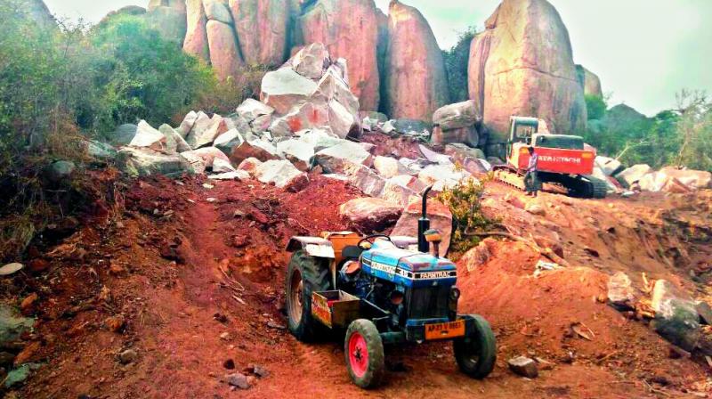 Rocks around Peeran Cheruvu being blasted for construction works. (Photo: DC)
