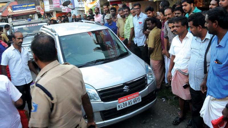 The car of Perinthalmanna magistrate which was blocked by public after it hit a pedestrian. (Photo: DC)