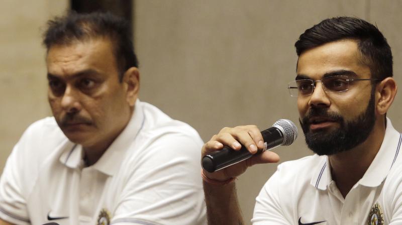 Team India coach Ravi Shastri and captain Virat Kohli during a press conference. (Photo: AP)