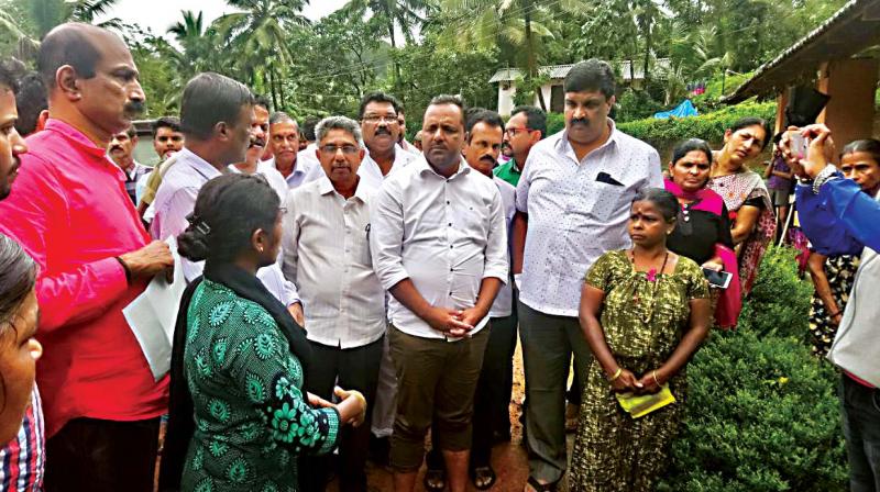 Minister U.T. Khader at flood-hit areas in Dakshina Kannada.