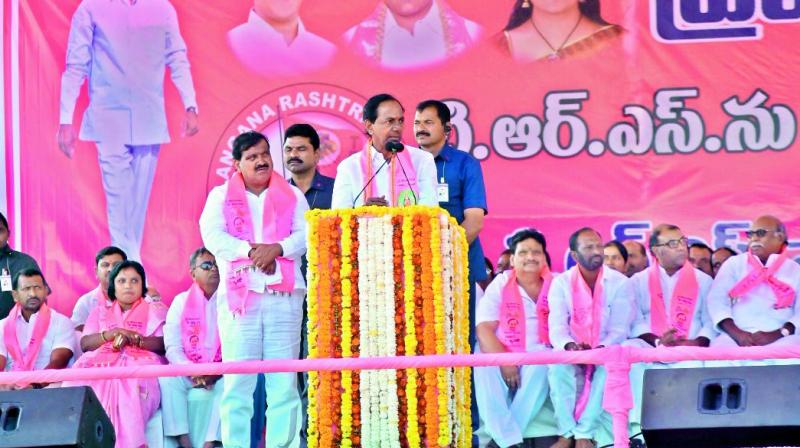 Caretaker Chief Minister and TRS president K. Chandrasekhar Rao addresses a meeting in presence of senior party leaders in Ibrahimpatnam on Sunday. 	 (DC)