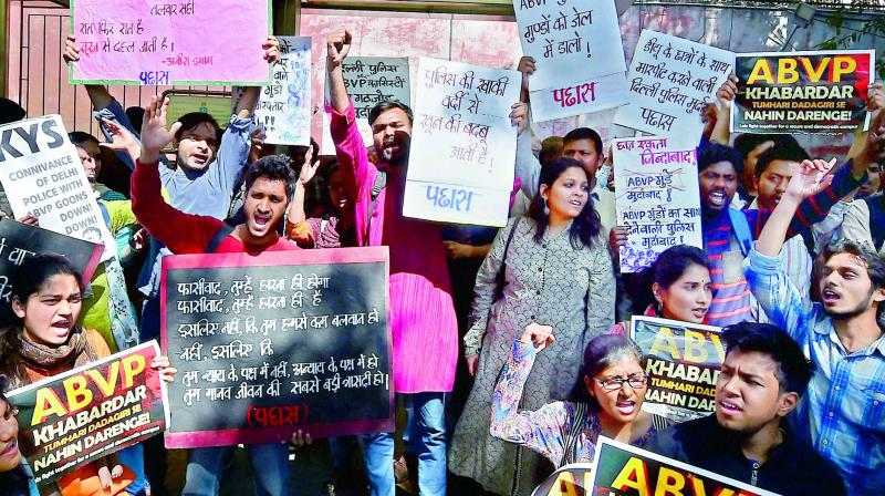 All India Students Association (AISA) and JNU students demanding arrest of Akhil Bhartiya Vidyarthi Parishad (ABVP) members in New Delhi on Thursday. (Photo: PTI)