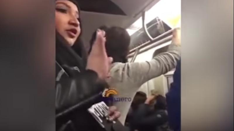 Video: Muslim couple racially abused in US, 23-year-old woman comes to their rescue