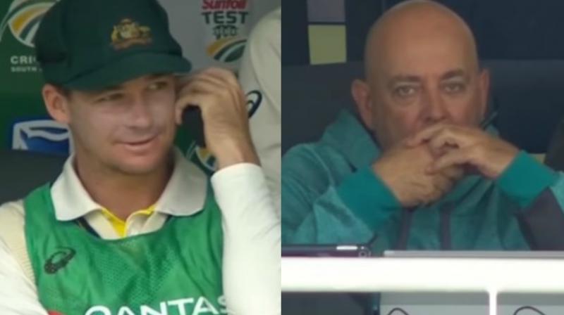 While Cameron Bancroft executed ball tampering in Cape Town Test against South Africa, Australian coach Darren Lehmann and substitute Peter Handscombs exchange on walkie-talkie may not be seen in isolation of the events in the saga. (Photo: Screengrab)