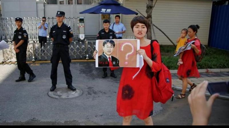 Li Wenzu has since heard little about her husband Wang Quanzhangs fate (Photo: Reuters)