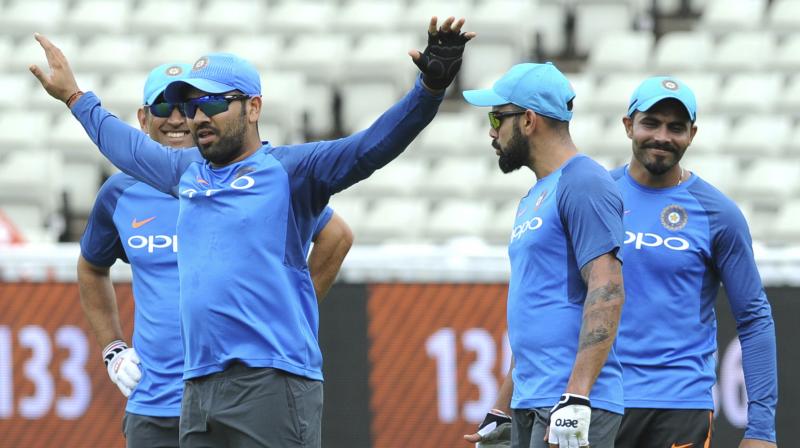 The weather forecast indicates chances of rain throughout the day as India take on Sri Lanka in second game in ICC Champions Trophy. (Photo: AP)