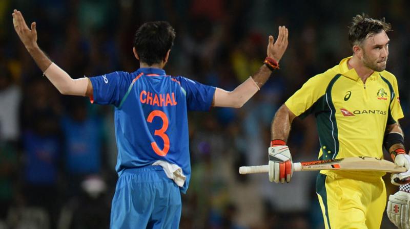 After having dismissed the 28-year-old Maxwell in the first three ODIs, Yuzvendra Chahal was at it again, as a catch by Jasprit Bumrah at short midwicket in the seventh over saw off the right-handed batsman.(Photo: AFP)