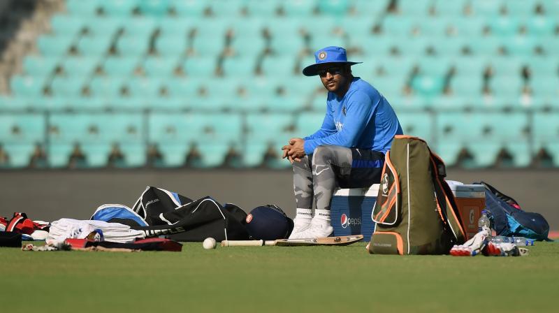 Although he stepped down from Indias limited-overs captaincy, Mahendra Singh Dhoni is still playing a proactive role in the team affairs as he on Saturday performed the leadership role. (Photo: AFP)