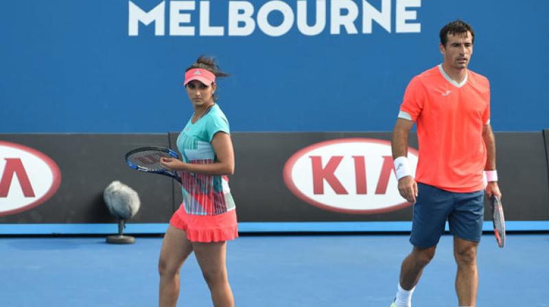 Second seeded pairing of Sania Mirza and Ivan Dodig got the better of reigning US Open defending champions, Laura Siegemund and Mate Pavic. (Photo: AFP)