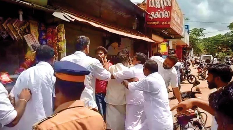 Hartal supporters forcefully shut down a shop at Neyyatinkara.