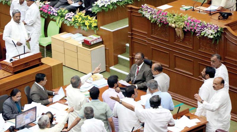 Assembly Speaker K.B. Koliwad tries to restore order during the session in Belagavi on Monday. 	(Photo: DC)