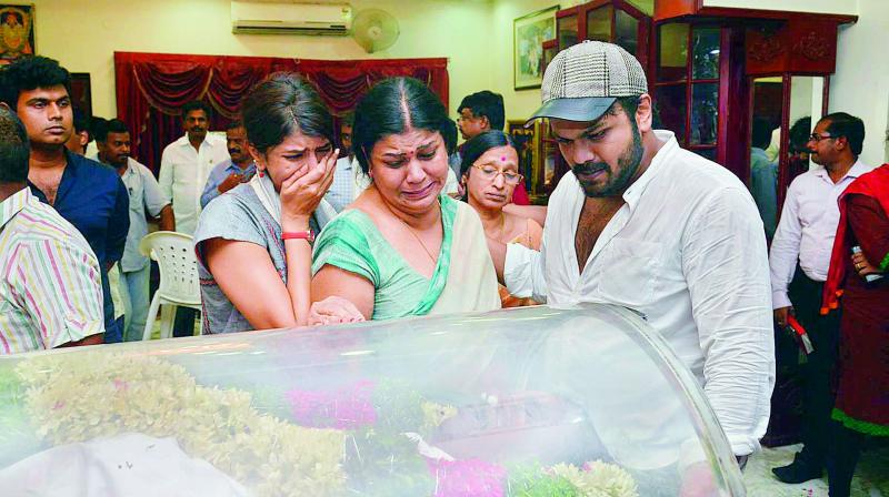 Lakshmi Manchu, Mohan Babus wife and son Manchu Manoj unable to hold back their tears as they pay respects to Dasari Narayana Rao at his residence in Hyderabad on Tuesday. (Photo: Deccan chronicle)