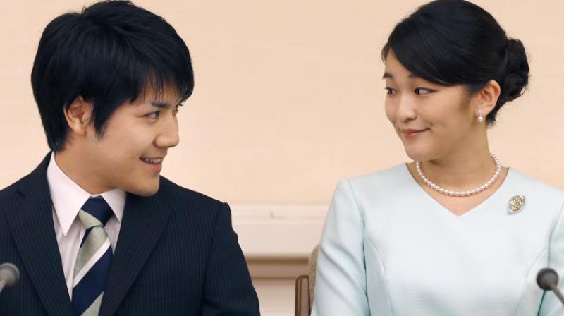Japans Princess Mako and fiance Kei Komuro. (Photo: AP)