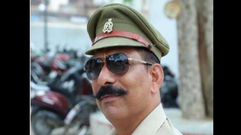 police officer, Subodh Kumar Singh had reportedly tried to control mob violence that had sparked after the carcasses of 25 cows were found in the fields in a village on Monday. (Photo: Twitter Screengrab/ @uppolice)