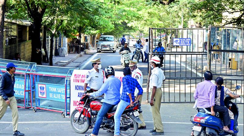 Commuters proceeding towards GHMC zonal office road, West Marredpally, are forced to take a detour due to nomination filing on Wednesday.  (Photo: S. Surender Reddy)