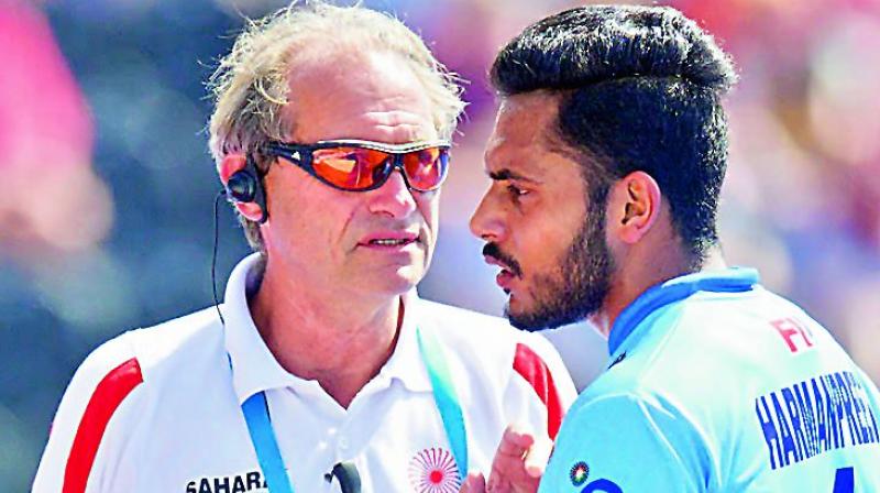 Coach Roelant Oltmans (left) will hope drag-flicker Harmanpreet Singh continues his good form against Malaysia on Thursday.