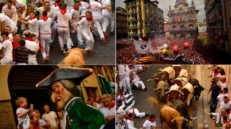 Thrill seekers run in front of fighting bulls at Spains San Fermin festival