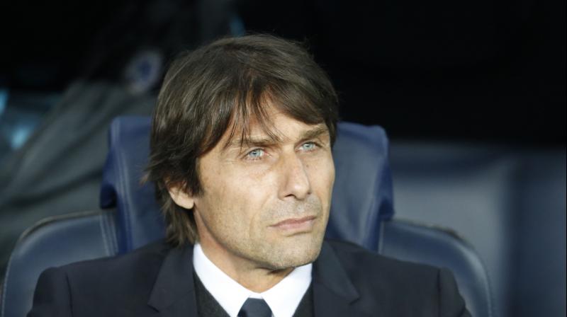 Chelsea began a terse, four-sentence statement on its website, Chelsea Football Club and Antonio Conte have parted company. (Photo: AFP)