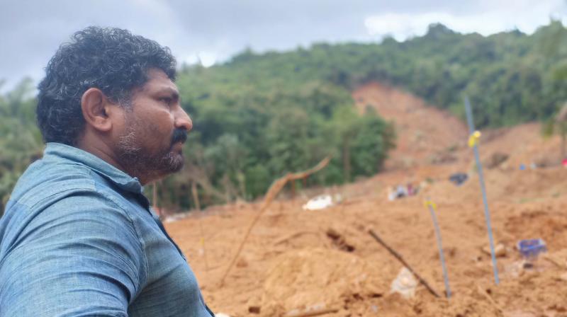 Sunil, the brother of Kannukuzhilyil Mohan who died in the landslide at the site of the disaster. The four-member family of Mohan had completely perished in the landslide. (Photo: DC)