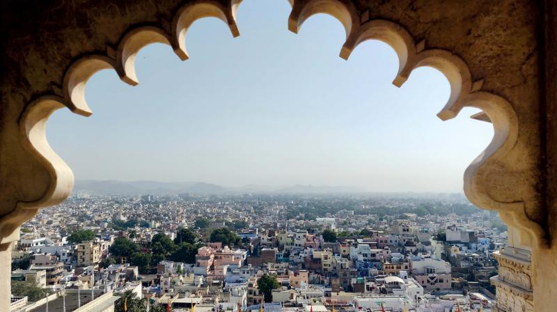 The city of Udaipur framed from the city palace