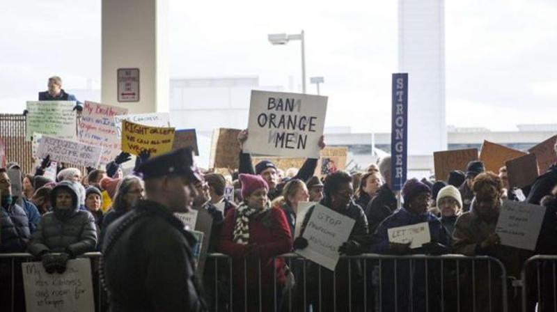 Demonstrators at Philadelphia International Airport protest against the executive order that President Donald Trump signed clamping down on refugee admissions and temporarily restricting travellers from seven predominantly Muslim countries on January 29, 2017 in Philadelphia, Pennsylvania. (Photo: AFP)