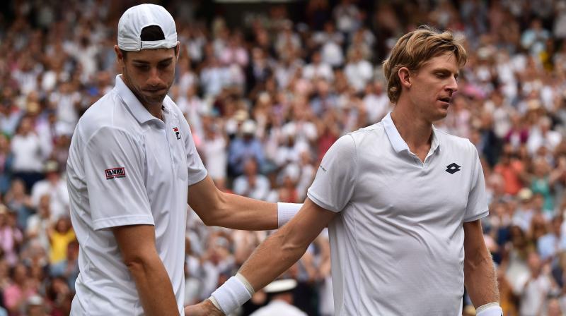 History books will show that Kevin Anderson came out on top against John Isner in a 7-6(6) 6-7(5) 6-7(9) 6-4 26-24 epic that lasted six hours and 36 minutes - the longest ever semi-final at Wimbledon - but those numbers fail to illustrate the astonishing feats of endurance shown by the two gladiators on the most famous stage in tennis. (Photo: AFP)