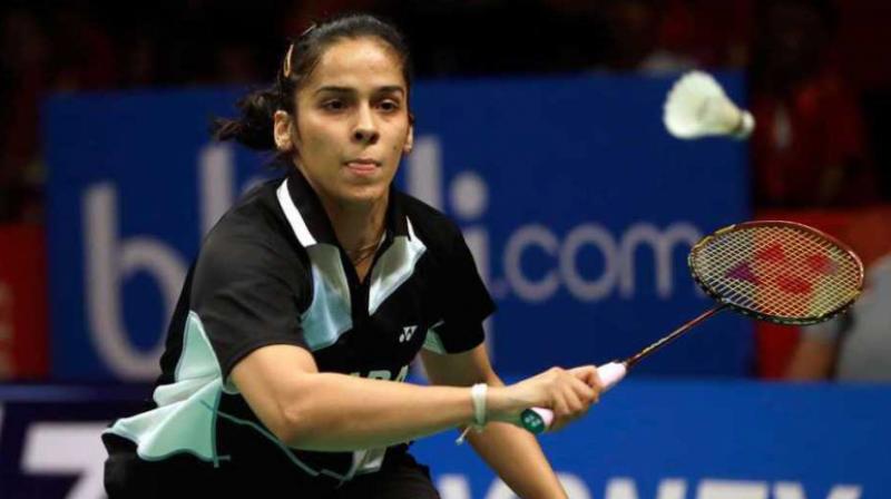 From a game down, Nehwal, the winner of the tournaments 2009, 2014 and 2015 editions, revived her drive to defeat Ruselli Hartawan of Indonesia 12-21, 21-7, 21-6 to book her place in the summit clash. (Photo: AP)