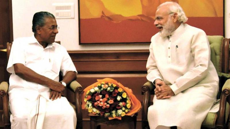 Kerala CM Pinarayi Vijayan with Prime Minister Narendra Modi during a meeting. (Photo: PTI)