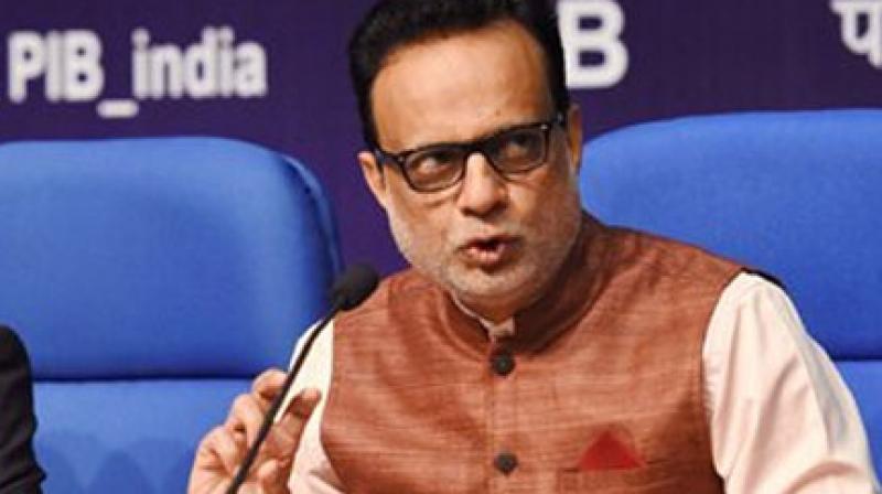 Personal I-T base must be up before corporate tax cut: Adhia