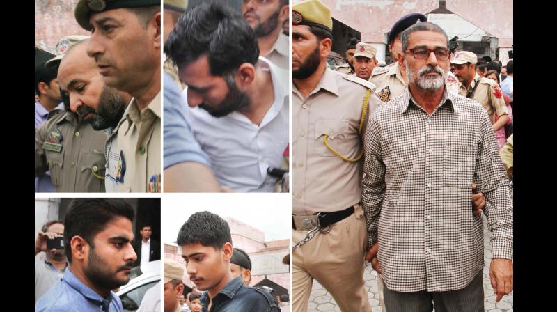 Prime accused Sanji Ram (R) and other accused in Kathua rape and murder case being produced in district court on Monday. (Photo: PTI )