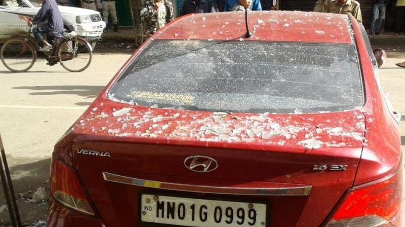 Car damaged in IED blast. (Photo: ANI Twitter)