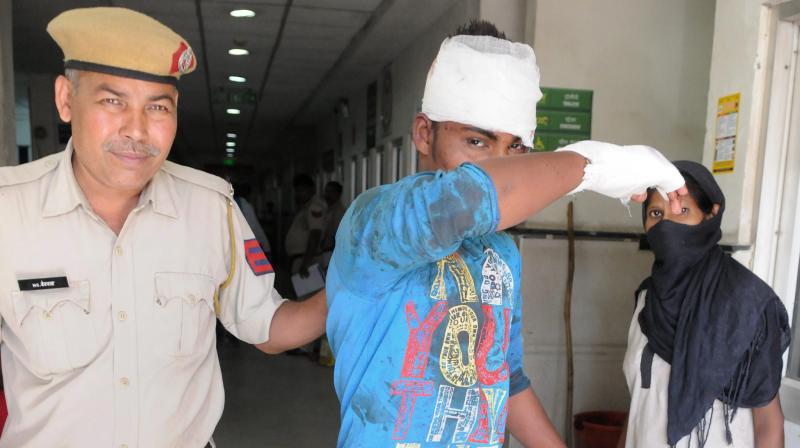 Police arrest accused Jitender, who allegedly attacked a northeastern girl with a knife MG Road Metro Station in Gurgaon. (Photo: PTI)