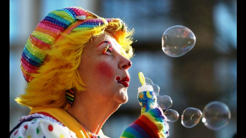 Canadian Annie Bannanie blew bubbles before an annual service in east London to honour Grimaldi. (Photo: AFP)