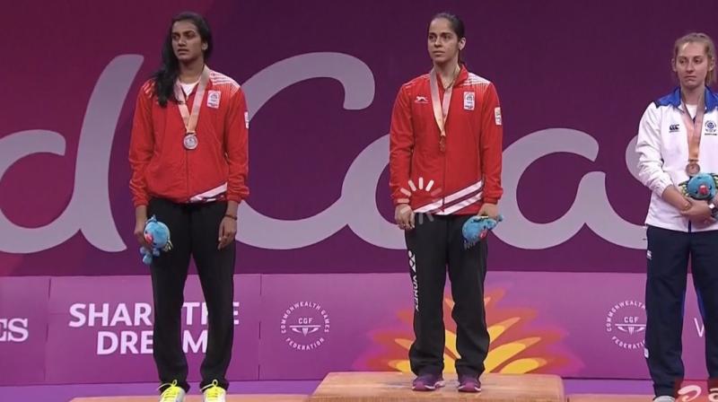 Saina was the pillar of Indias gold-winning campaign in the team championship earlier, playing every one of the singles matches due to Sindhus injury. (Photo: IOA / Twitter)