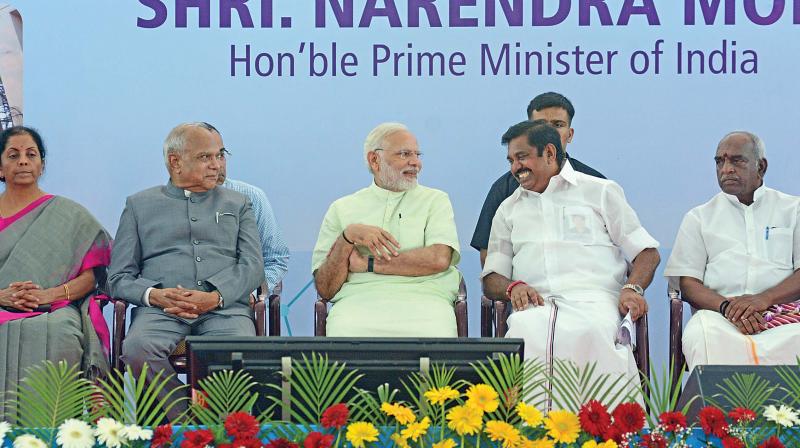 Prime Minister Narendra Modi and Chief Minister Edappadi K. Palaniswami share a light moment during the inauguration of slew of projects at the Cancer Institute (WIA), Adyar, in the city on Thursday. Governor Banwarilal Purohit and Union ministers Nirmala Sitharaman and Pon Radhakrishnan look on. (Photo: DC)