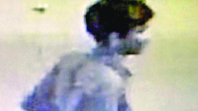 A CCTV grab of suspect  picture