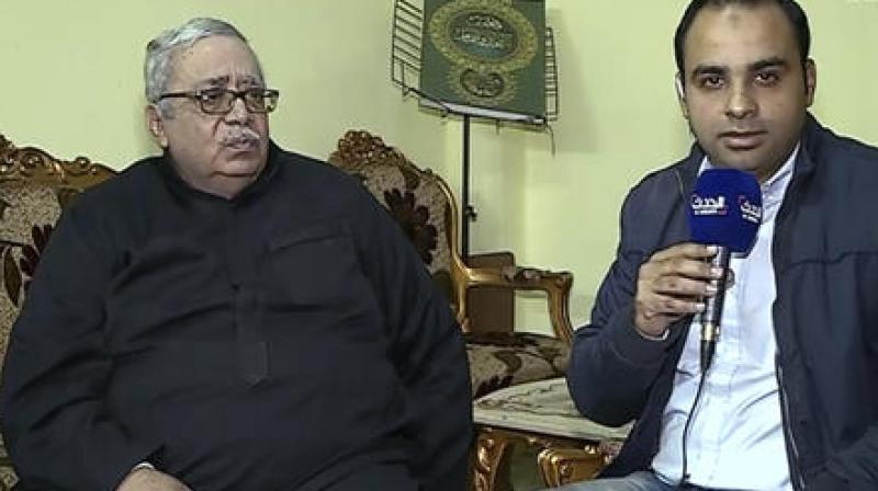 The father of the alleged Louvre attacker, Egyptian-born Abdullah Reda Refaie al-Hamahmy, 28, Reda Refae al-Hamahmy, left, gives an interview to al-Hadath, in his Nile Delta home, aired Saturday. (Photo: AP)