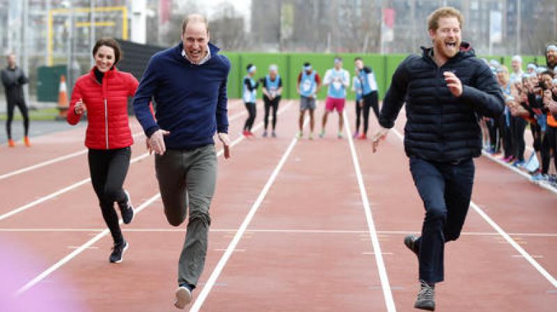 Britains Prince William, second left, Kate, the Duchess of Cambridge, left, and Prince Harry take part in a relay race, during a training event to promote the charity Heads Together, at the Queen Elizabeth II Park in London. (Photo: AP)